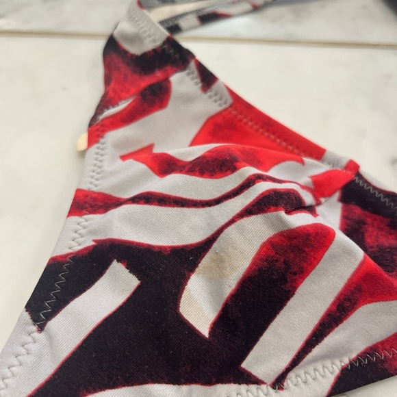Ulu Red and Black Patterned Bikini. Has a stain on the top. - Picture 4 of 5